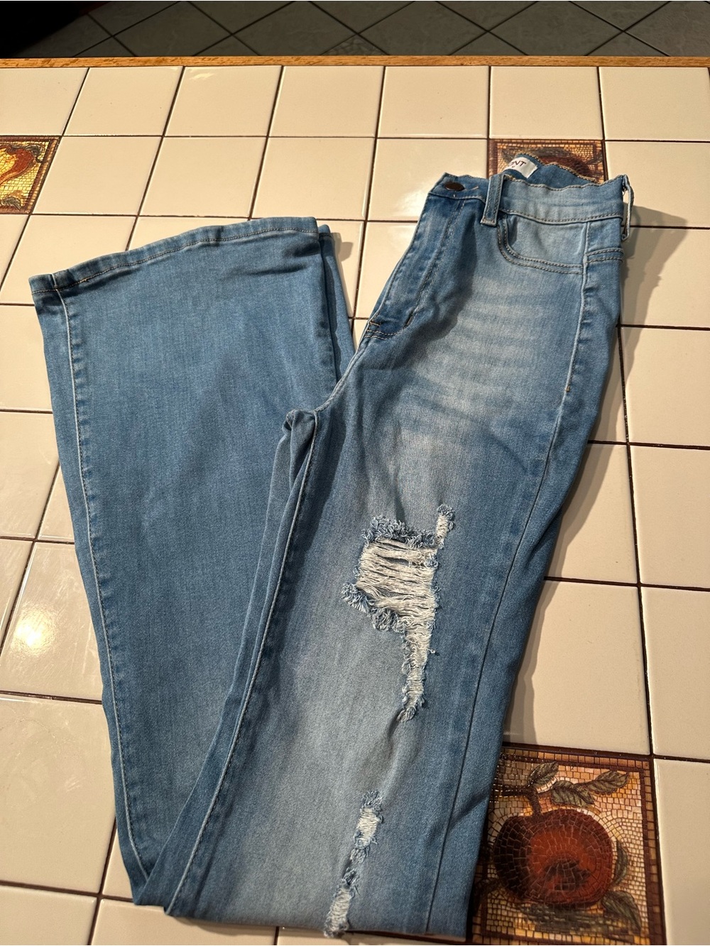 Vibrant Light Blue Distressed Flare Jeans